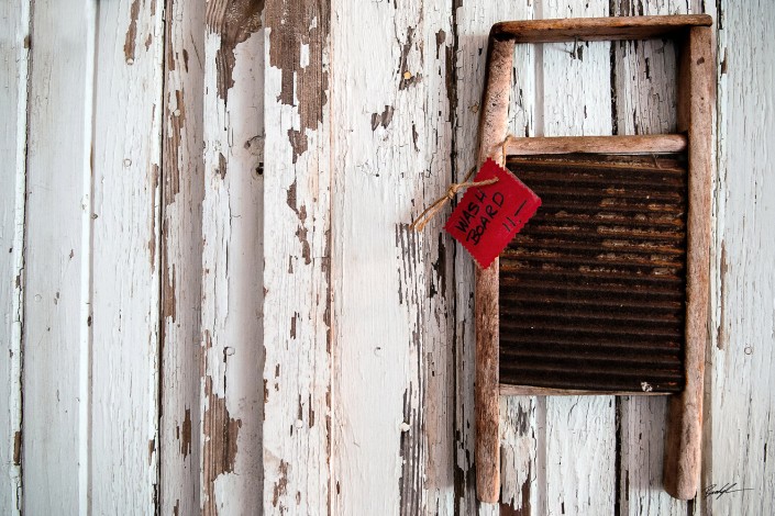 rusty washboard on a wall