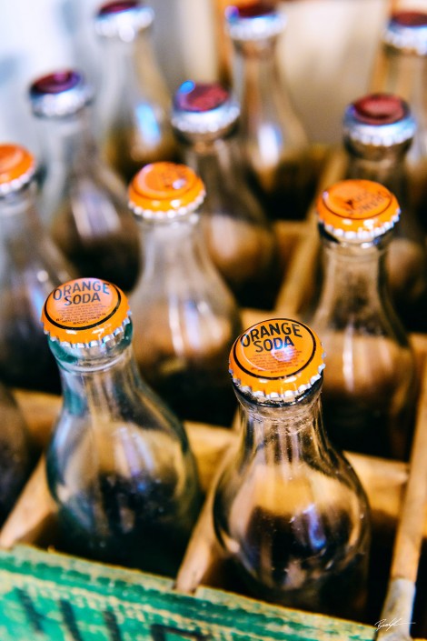 Orange Soda Bottles and Crate