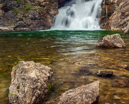 Running Eagle Falls Glacier National Park Montana