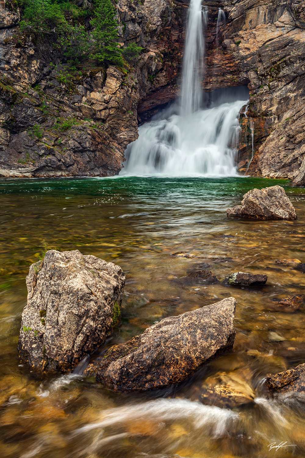 Running Eagle Falls Glacier National Park Montana