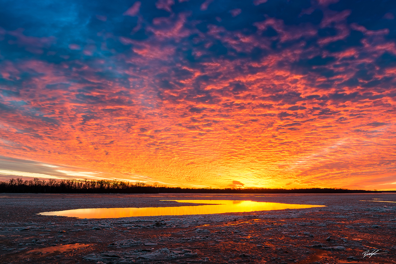 Sunset Over a Frozen Mississippi River